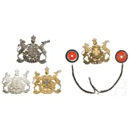 Piccola collezione di emblemi per elmetti e ricambi, circa 1900