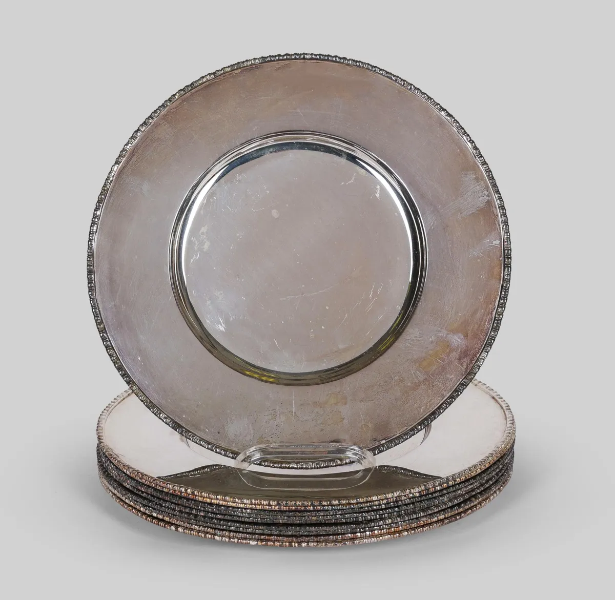 Dix assiettes de présentation, argent 835