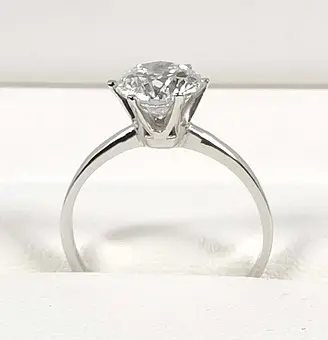 Anello solitario, oro bianco 585.