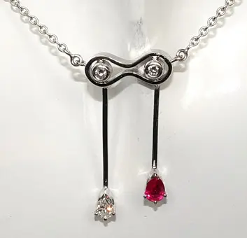 吊坠 / 项链 金 红宝石 0,36 ct.，钻石 0,25 ct.，链 37 厘米 585/14K 4,8 克。