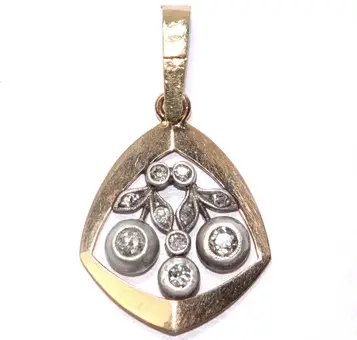 Colgante oro diamantes talla antigua 0,34 ct.