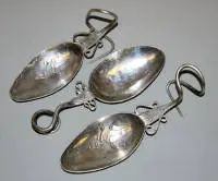 Tre "Tupu" i sølv, dragtnåle i form af skeer, statussymbol for Sydamerikas oprindelige andesfolk og udtryk for kulturel oprør, 1700-/1800-tallet