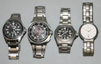 四块Citizen Titanium HAU手表，其中三块Eco-Drive机芯