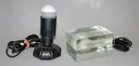 Gino Sarfatti 与 Harri Koskinen，1960 年代和 90 年代两款创新设计灯具