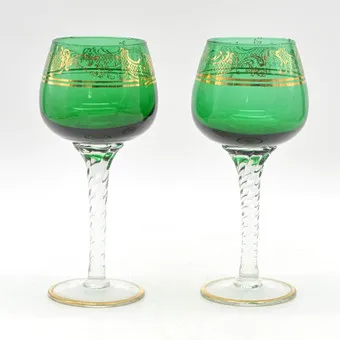 Ferro & Lazzarini。一对穆拉诺高脚杯，工作室玻璃，镀金装饰，意大利，20世纪。