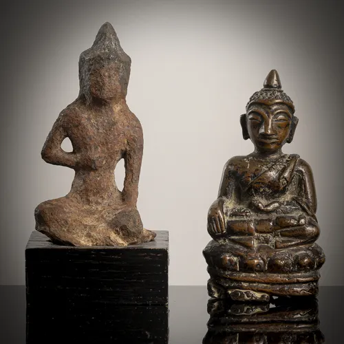 Twee figuren van brons en ijzer