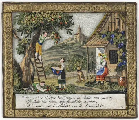Velsignelsesønske med initialerne "J. E." på hvidt glanspapir, ramme af præget guldgalon. Wien, ca. 1820. 7,5 x 8,8 cm.