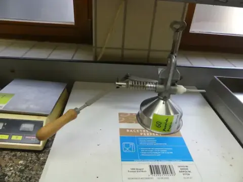Manuaalinen hillotäyttölaite