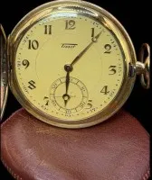 扁平机械弹簧盖怀表 HTU "Tissot" 双表壳，机芯运转，保存良好，直径 5 cm，附皮套