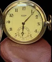 Orologio da tasca meccanico piatto con coperchio a molla HTU "Tissot", cassa doppia, movimento funzionante, ben conservato, D-5 cm, astuccio in pelle