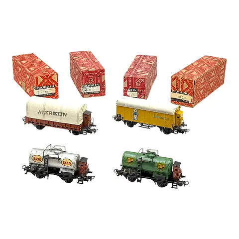 Märklin quatre wagons de marchandises : BP, Esso, Jamaica et wagon bâché, échelle H0, OVP