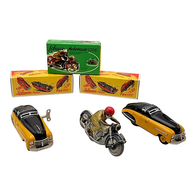 Jouets en tôle Schuco, Motoracer 1006 et deux Fex 1111 à mécanisme, en emballage d'origine
