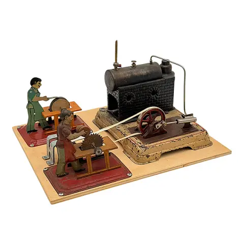 Machine à vapeur avec scie circulaire et touret à meuler sur plaque de bois, jouet en tôle, années 1950