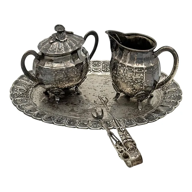 Service à la crème, pot à lait, sucrier, pince à sucre, plateau, argent 800 et 835, décor rocaille