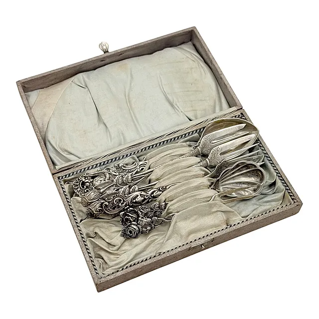 Service à découper en six pièces, argent 800 et 835, rose de Hildesheim et poignée ange, en coffret