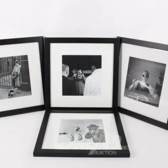 4 zarámované černobílé fotografie