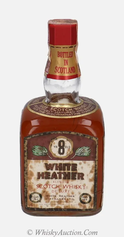 De Luxe 8 år
