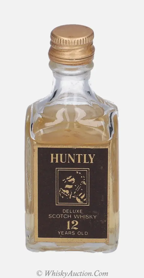 De Luxe 12 år