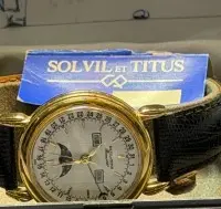 Kvartsur "Solvil et Titus" med månefase, orig. æske og faktura, 1997, tilsyneladende ubrugt