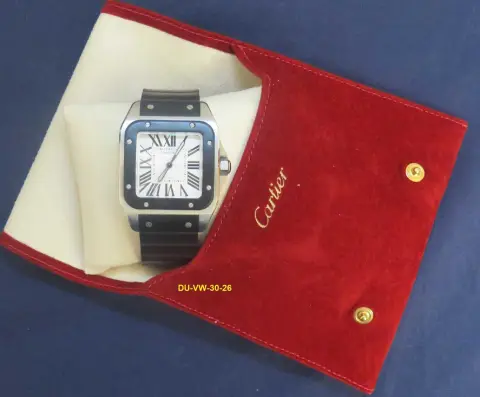1 armbåndsur Cartier Santos 100 med monteringspude og servicepose