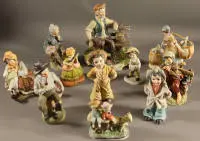 Onze figurines en porcelaine biscuit, seconde moitié du 20e s.