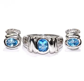 Conjunto, anillo y pendientes con topacio y diamantes