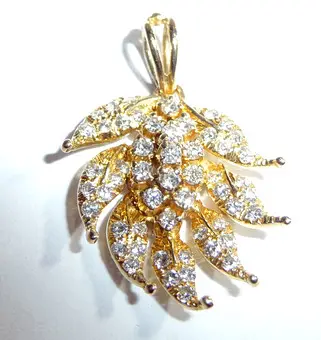 Colgante oro 750 0,50 ct brillantes forma de hoja