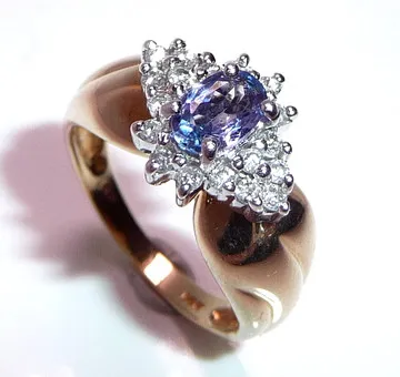 Ring 585 / 14 K guld tanzanit diamanter str. 53.