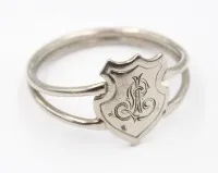 Servietring, sølvfarget, dekorativt monogram, ca. diam. 5 cm