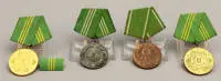 Lot von 4 DDR Orden, Ministeriums des Innern