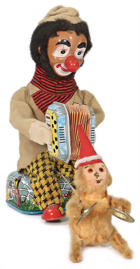 Jouet à batterie, clown avec singe