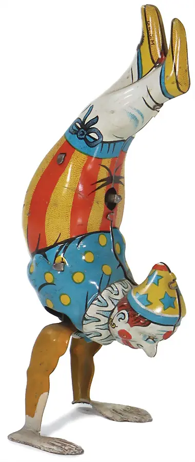 Clown en équilibre sur les mains