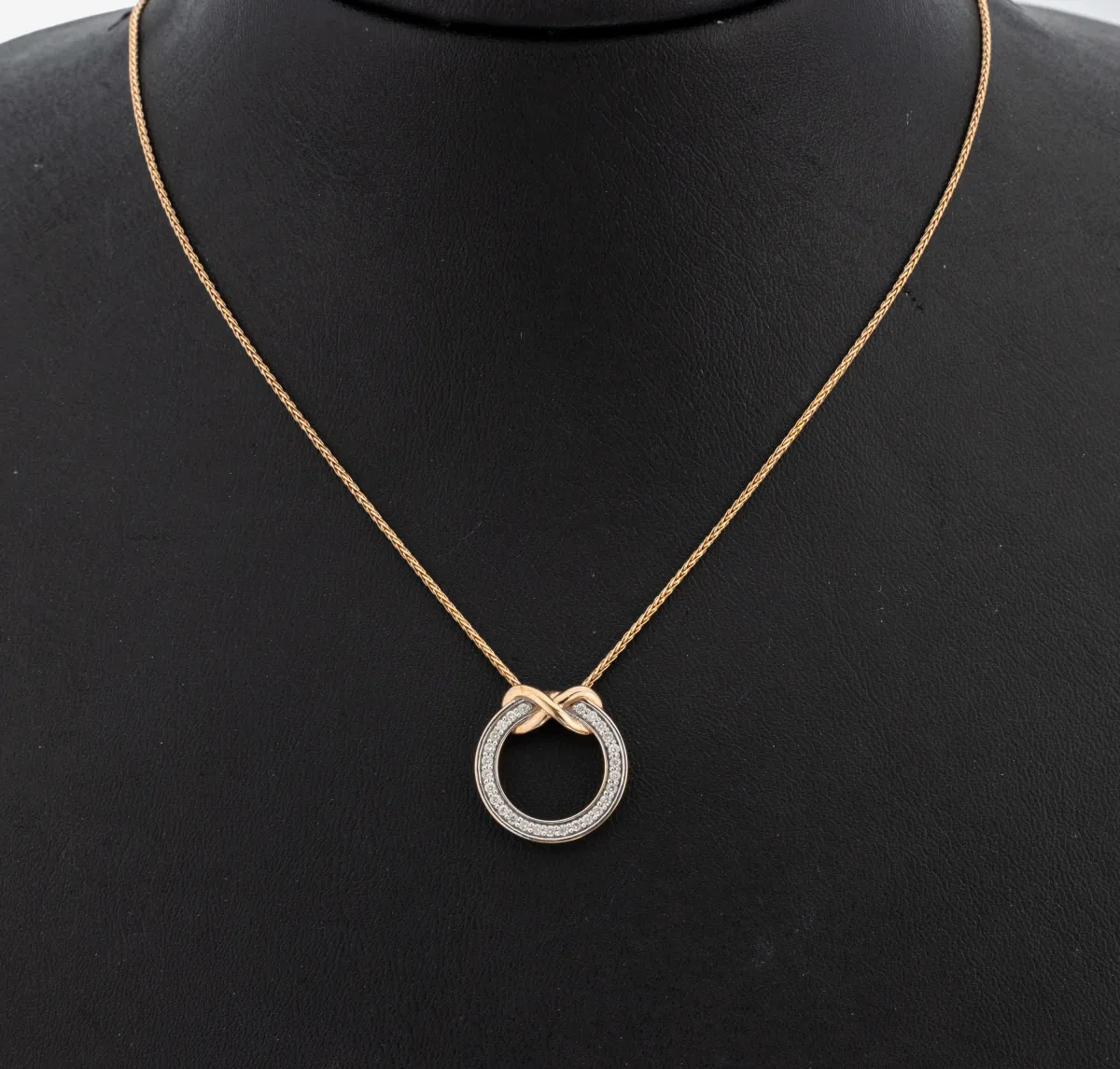 9 kt gold diamond pendant, RG/WG 375/000, simple circle with bow ornament, 27