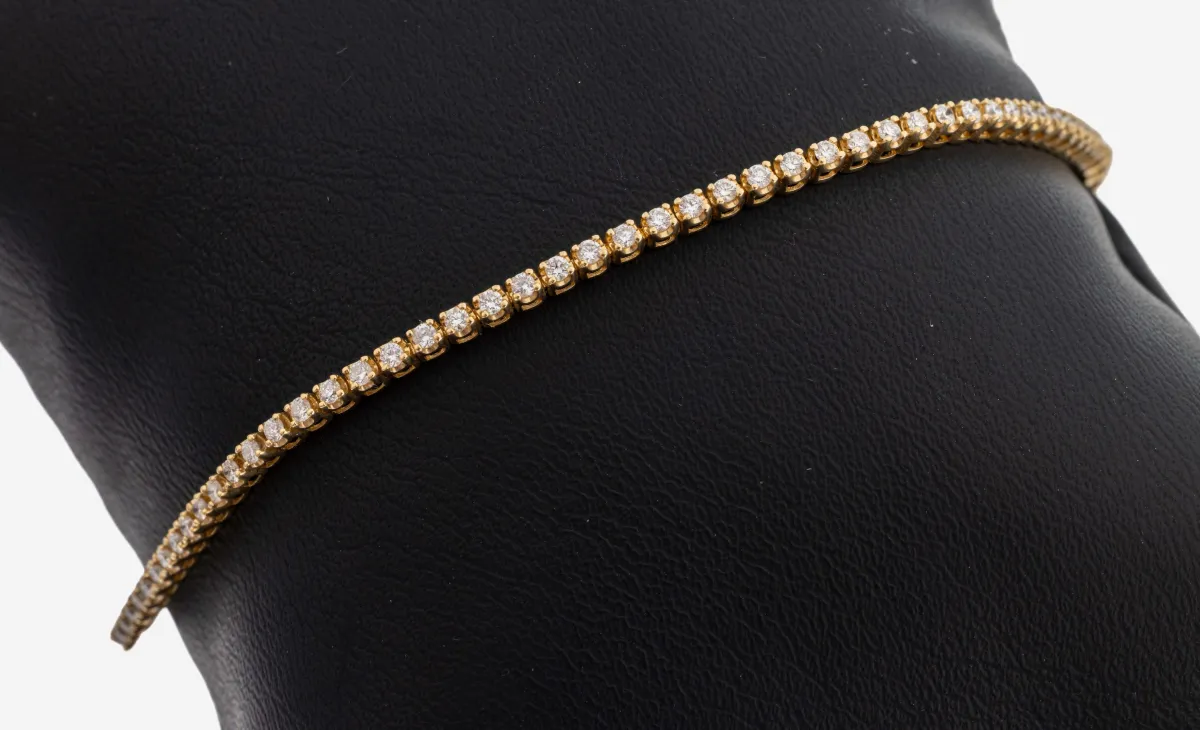 14 kt gold diamond line bracelet, yellow gold 585/000, 85 individually set diamonds total approx.