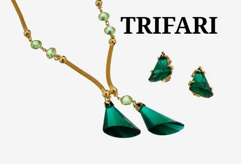 Parure TRIFARI, USA années 1950, métal doré, signée, comprenant : collier,