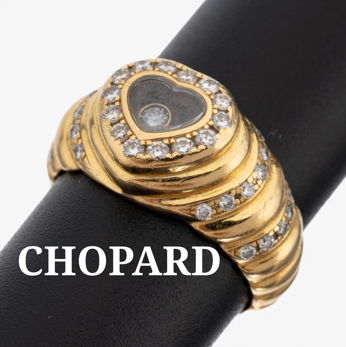Bague diamant CHOPARD or 18 kt, 750/000, structure étagée, tête en cœur, 1