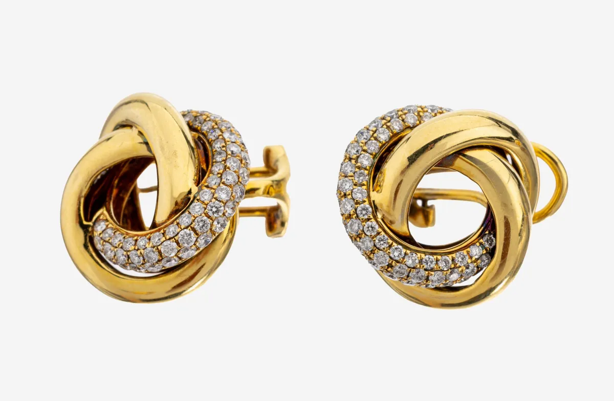 Pair of 18 kt gold diamond stud earrings, 750/1000 gold, knot shape, approx. 128 diamonds