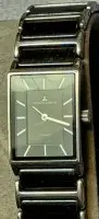 DAU al quarzo "Jaques Lemans" Ceramic, movimento non verificato, segni d'uso