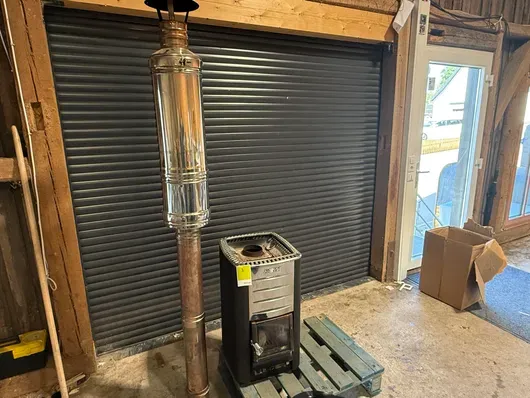 Harvia wood-fired sauna stove with chimney