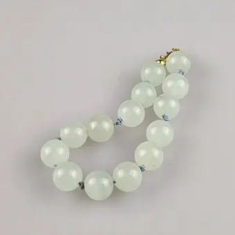 BRACCIALE – Cina, chiusura a moschettone in oro giallo 585/000.