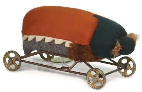 STEIFF – maikäfer extrêmement rare sur petites roues à rayons en fonte