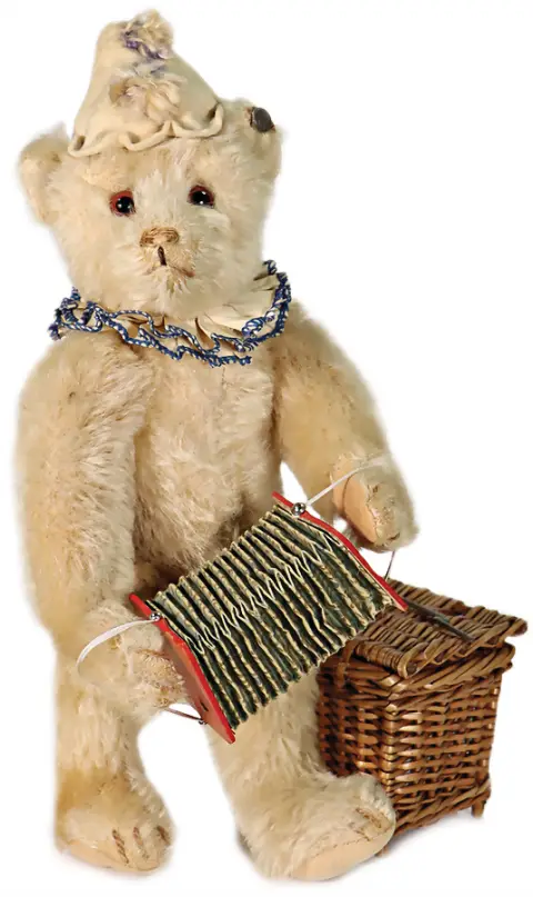 STEIFF – charmant ours clown jaune