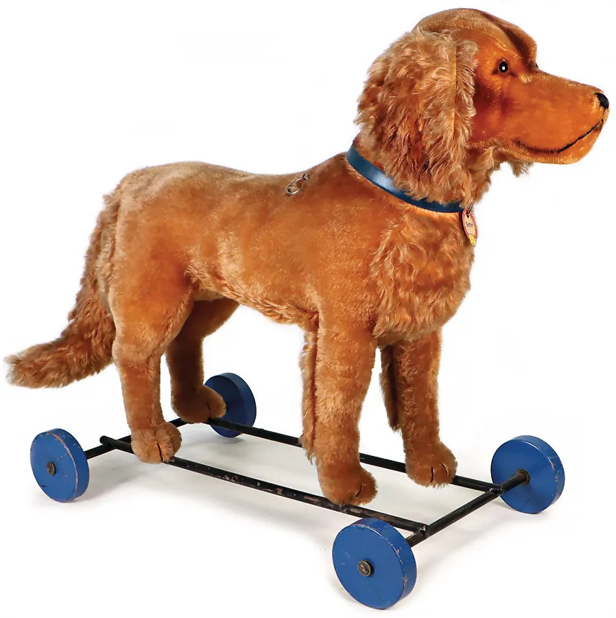 STEIFF – grand setter sur roulettes en bois bleues