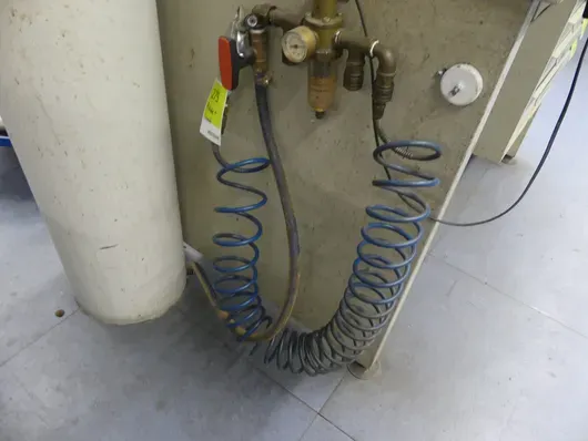 Tuyau spiralé d'air comprimé avec pistolet