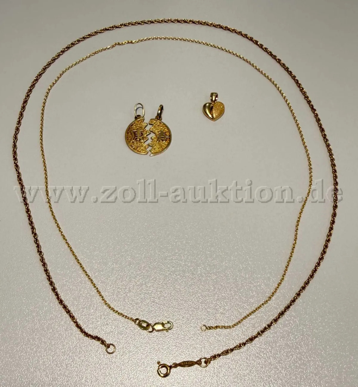 Lot of 2 gold chains and 2 gold pendants in 585 gold