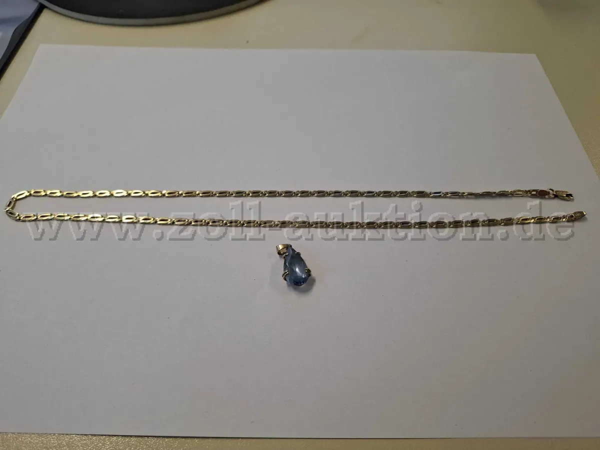 1 gouden ketting met blauwe steenhanger – 585 / 333 goud