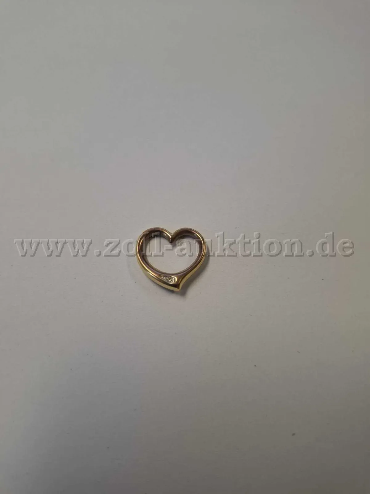 1 Goldanhänger in Herzform – 333er Gold mit klarem Stein