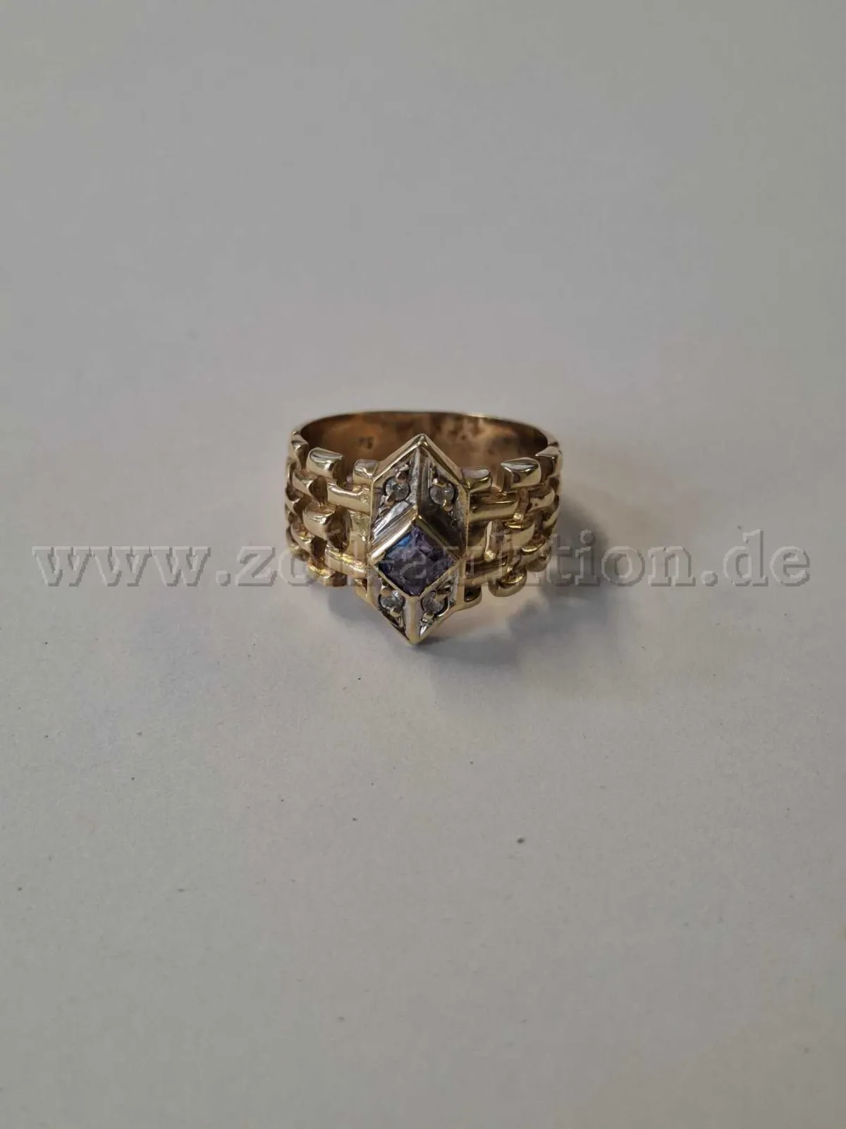 1 anillo de oro con piedra lila y piedras claras – oro de 585