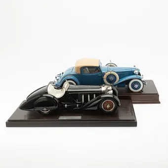 Dos coches de modelo: Mercedes Benz 1930 TYP SSK carrocería para Conte Trossi 076/999 + The Danbury Mint 1929 Cord L-29 Special Coupe (2).