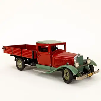 MÄRKLIN. Camión de plataforma de construcción de hojalata 1101.